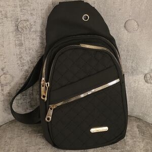 Black Crossbody Purse With Strap And Front Pockets With Gold Accents